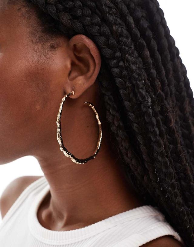 ASOS DESIGN hoop earrings with textured molten detail in gold tone Product Image