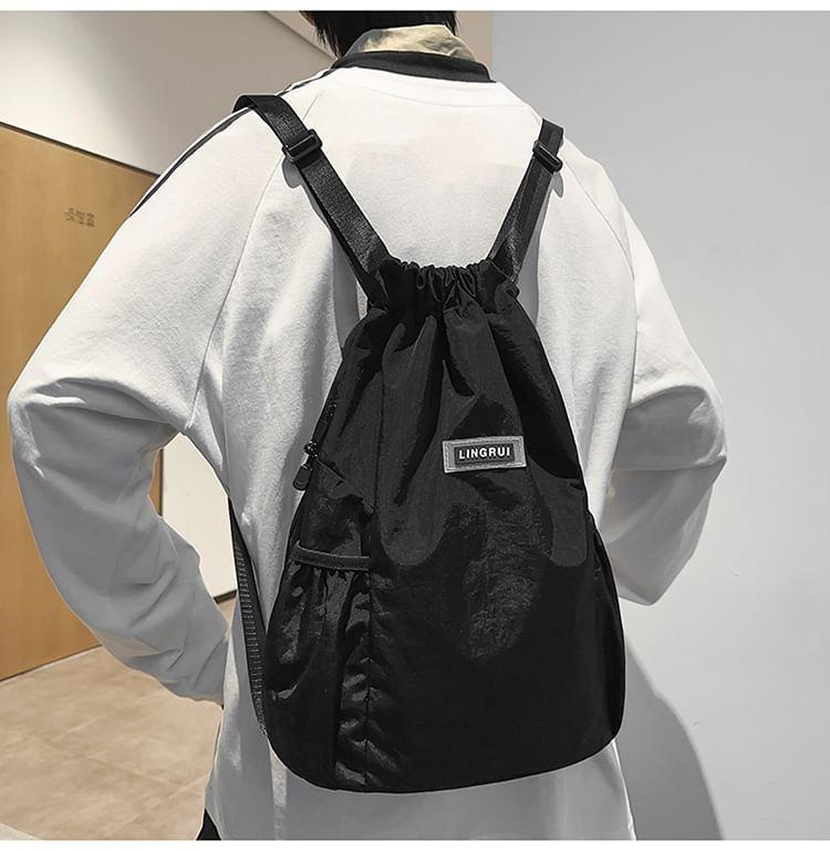 Lettering Applique Drawstring Nylon Backpack Product Image