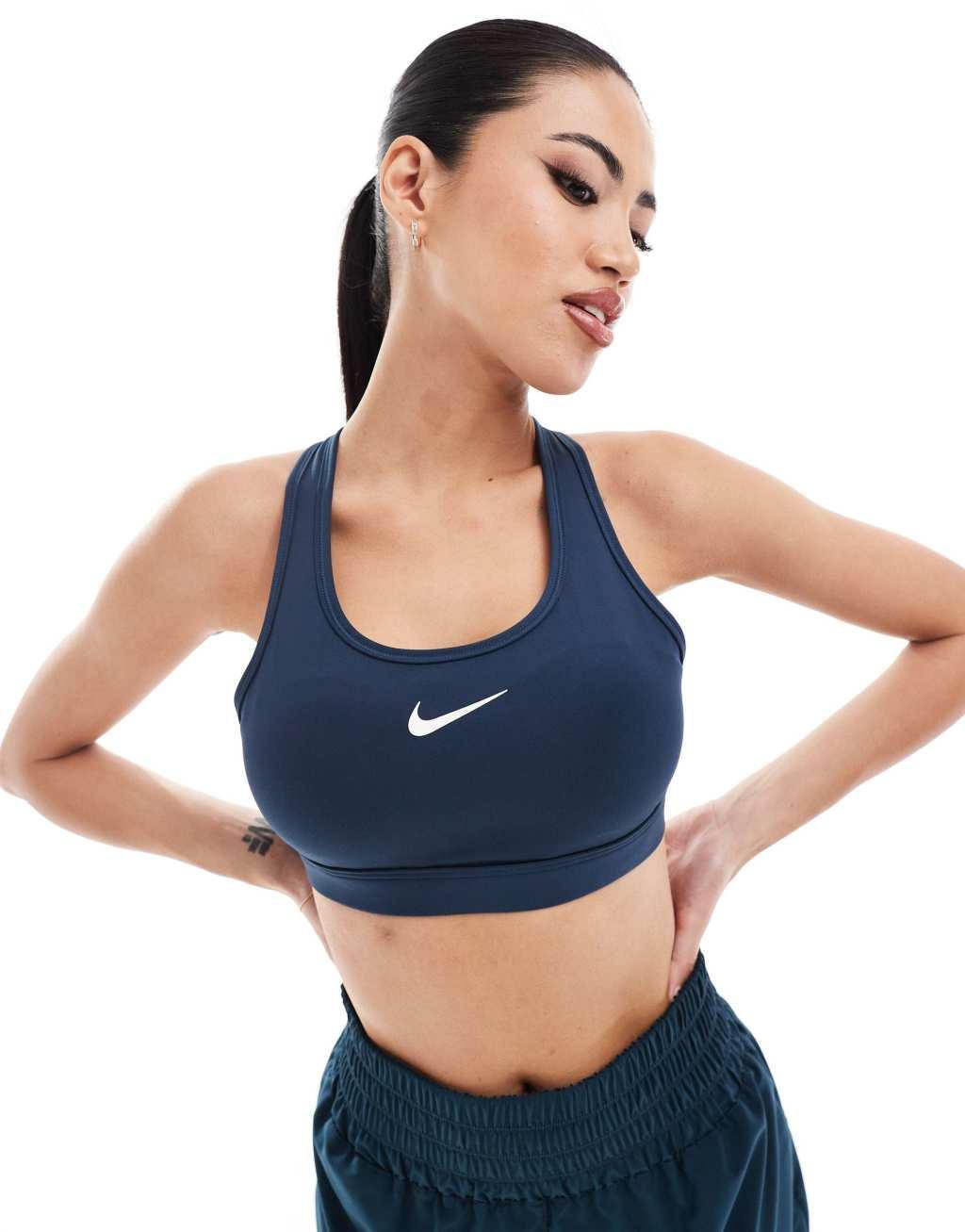 Nike Training Swoosh medium support sports bra in navy Product Image