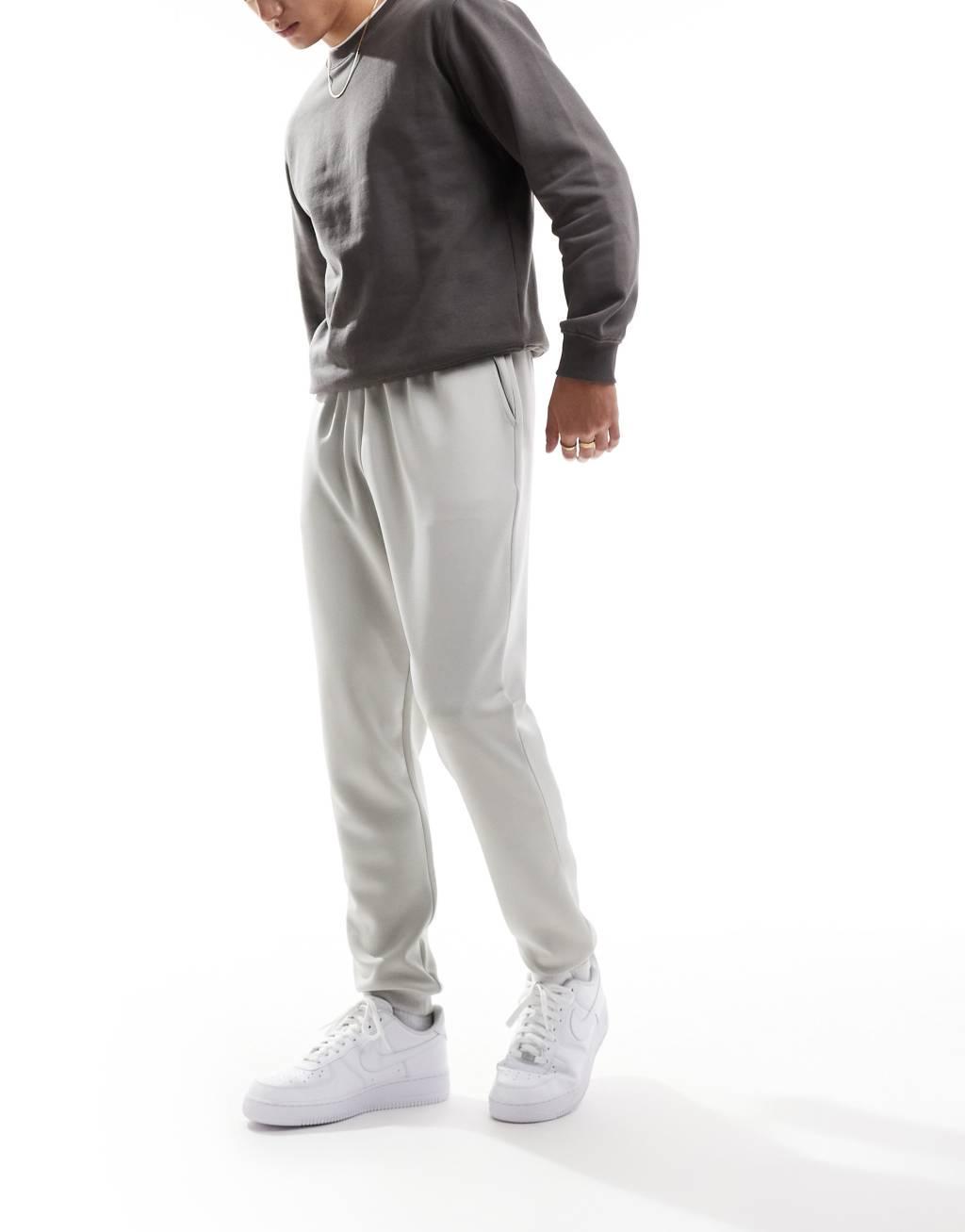 ASOS DESIGN skinny scuba sweatpants in light gray Product Image