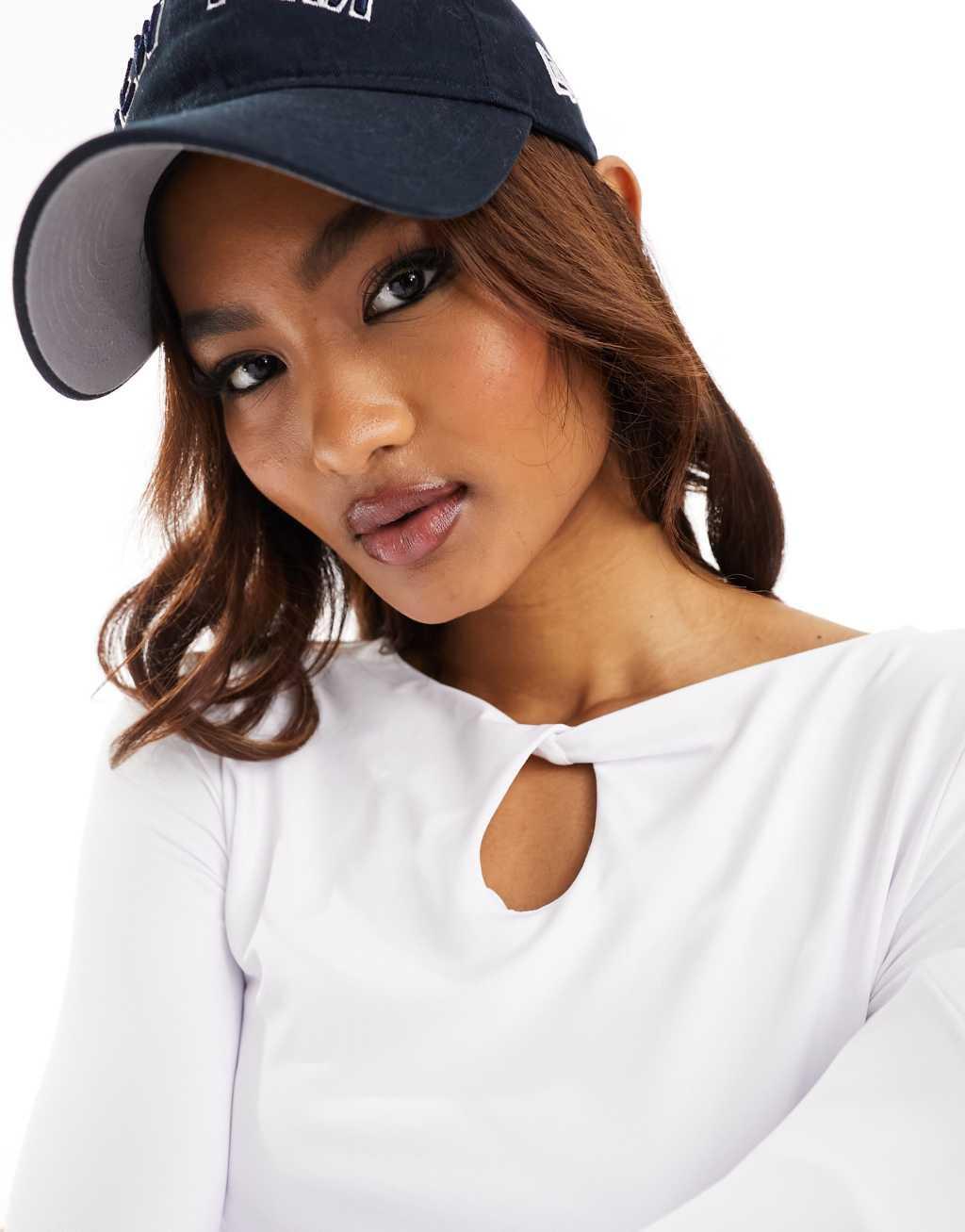 ASOS DESIGN twist front slinky top in ivory Product Image