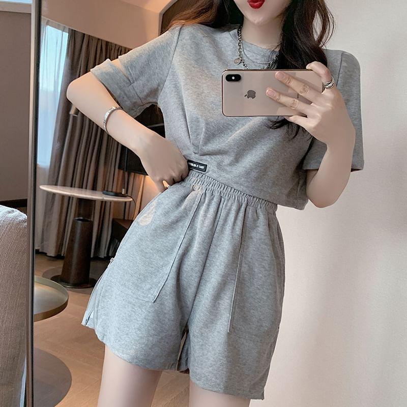 Set: Short-Sleeve Crew Neck Plain Cutout Crop T-Shirt + High Waist Zip Detail Shorts Product Image