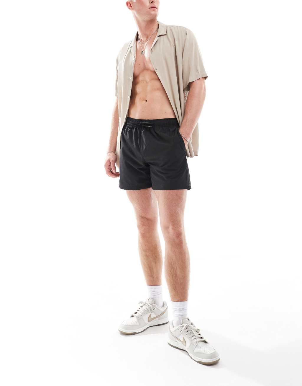 Cotton On stretch swim shorts in black Product Image