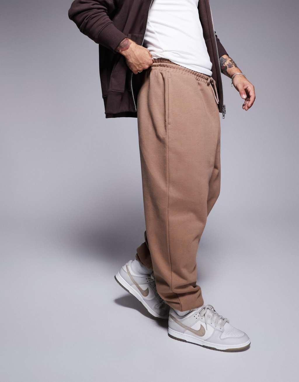 ASOS DESIGN premium heavyweight oversized sweatpants in beige Product Image