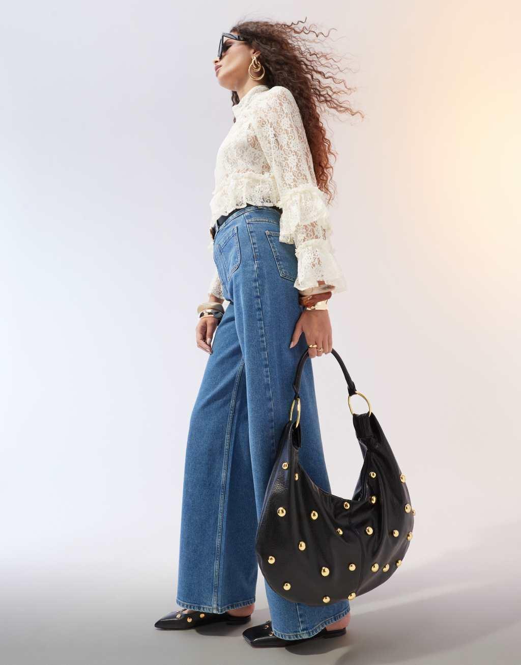 ASOS DESIGN clean wide leg jeans with front pockets in mid blue Product Image