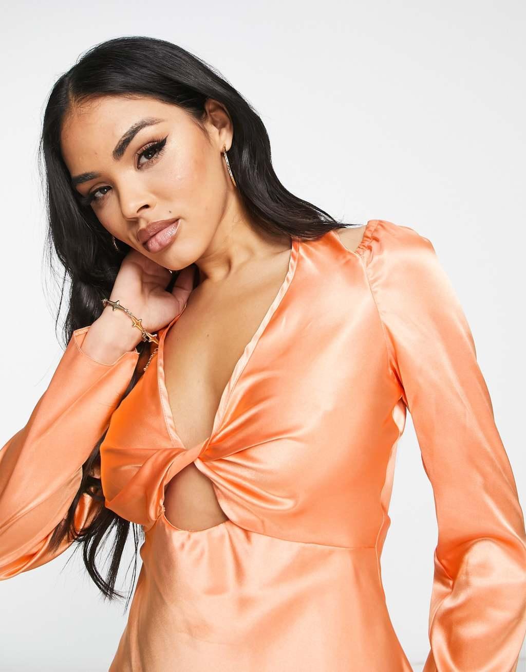 ASOS DESIGN twist front satin blouse with halter neck in peach Product Image