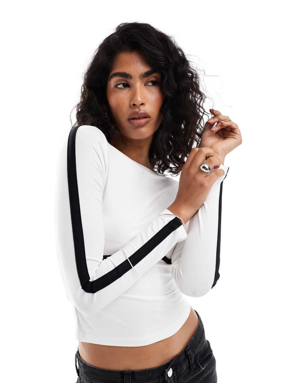 ASOS DESIGN underbust detail contrast binding top in white Product Image