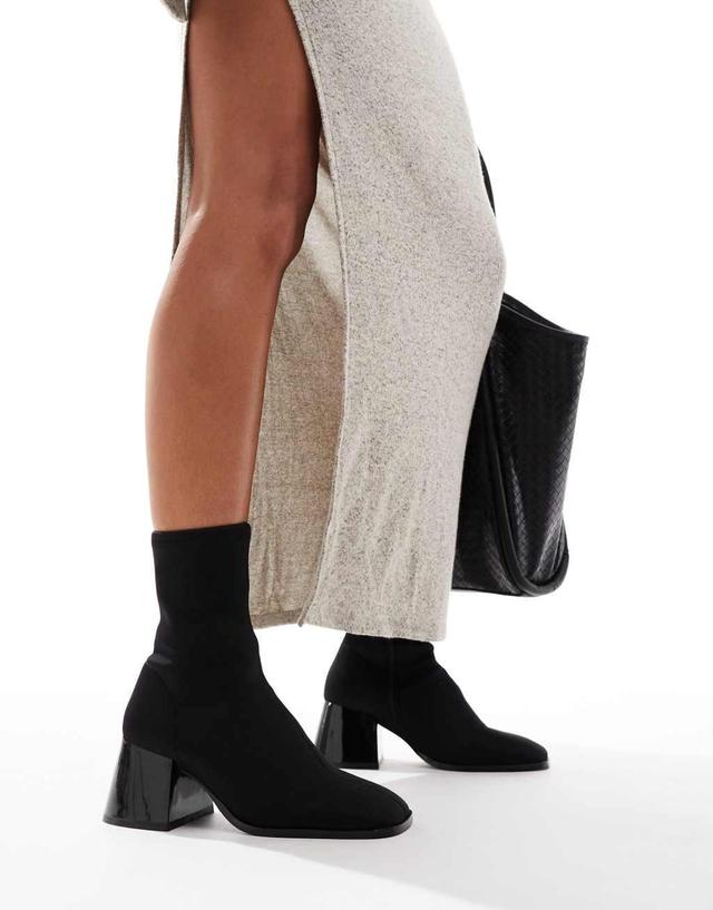 ASOS DESIGN Radiant flared block heel boots in black neoprene Product Image