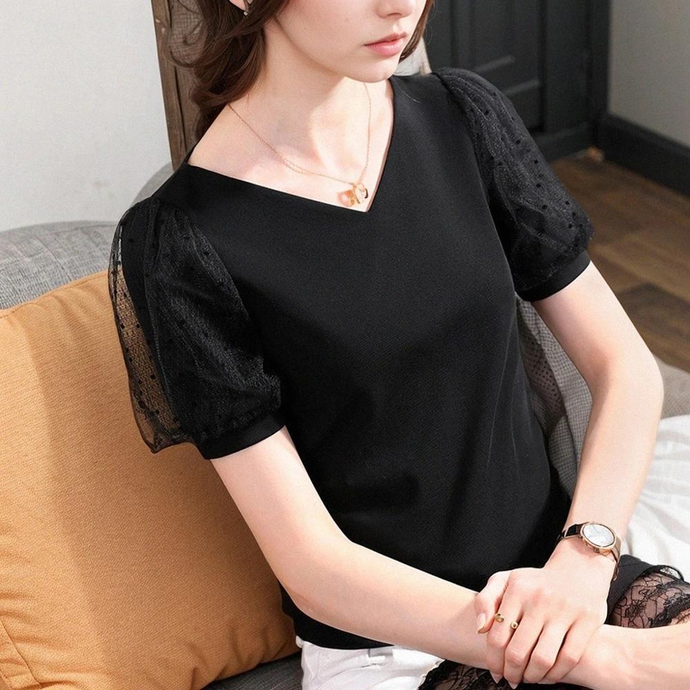 Olivia Mark –  Stylish V-Neck Cotton T-Shirt with Polka Dot Mesh Insert, Short Sleeves, and Elegant Puff Sleeves Product Image