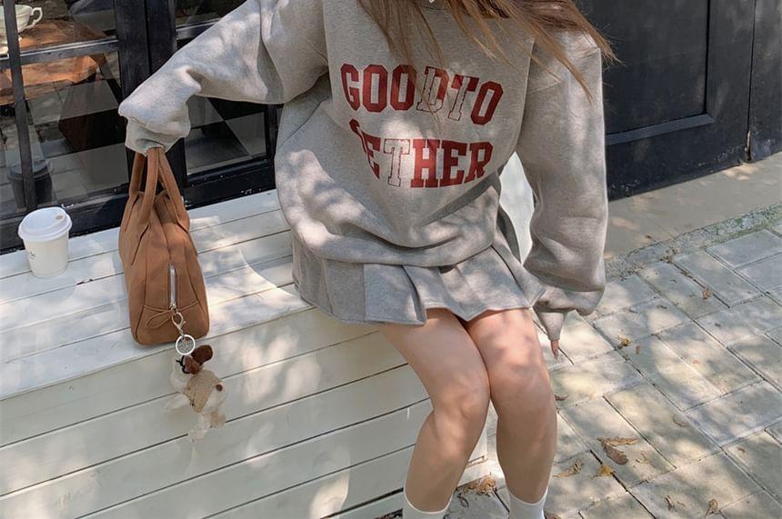 Set: Crewneck Lettering Pullover + Mini Pleated Skirt Product Image