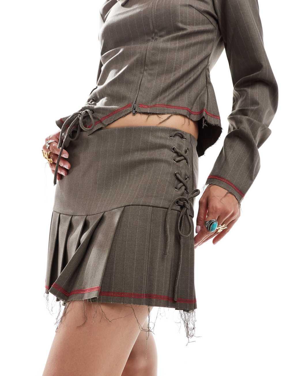 COLLUSION pleated mini skirt with lace up detail and raw hem - part of a set Product Image