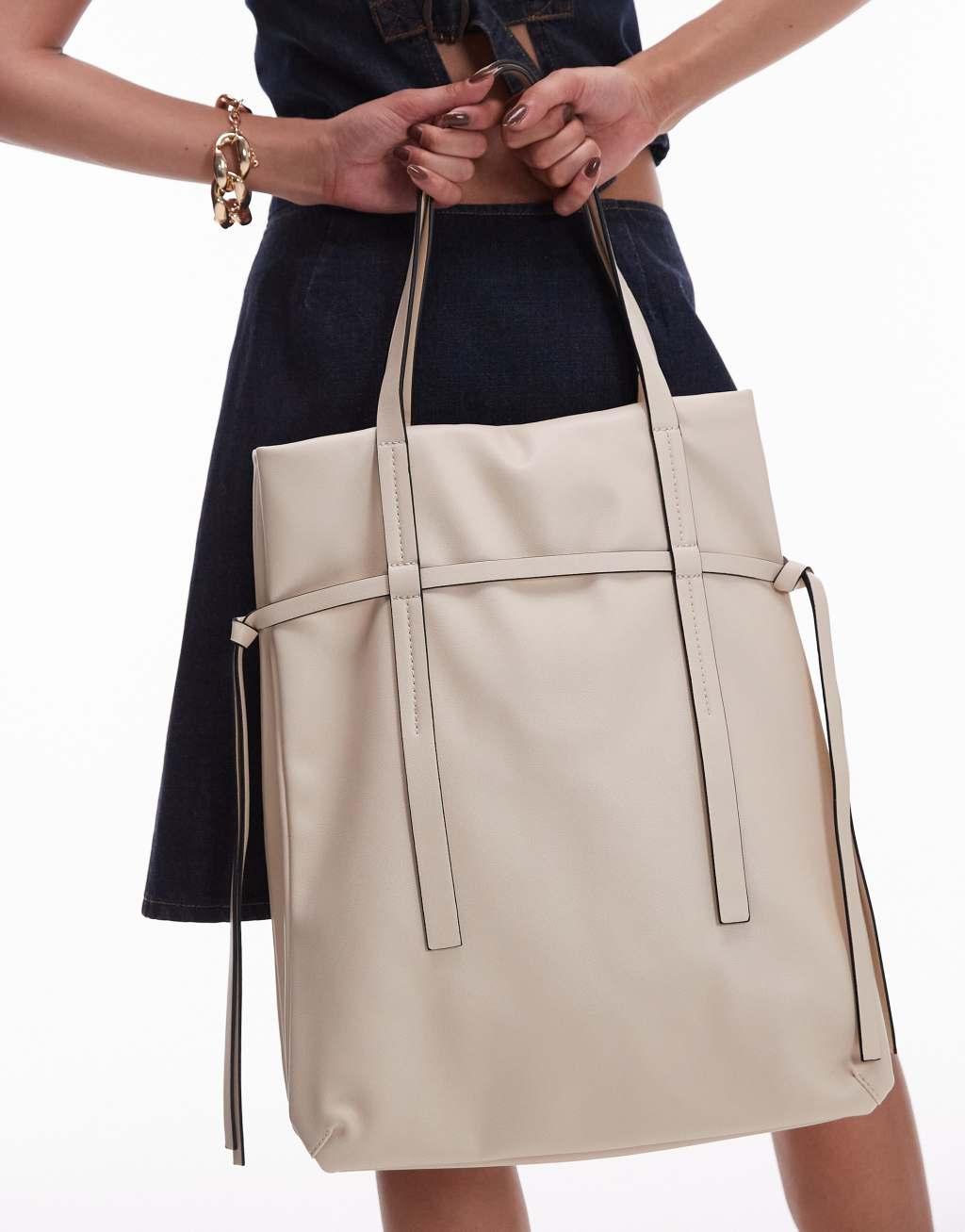 Topshop Tucker tote bag with strap detail in off white Product Image