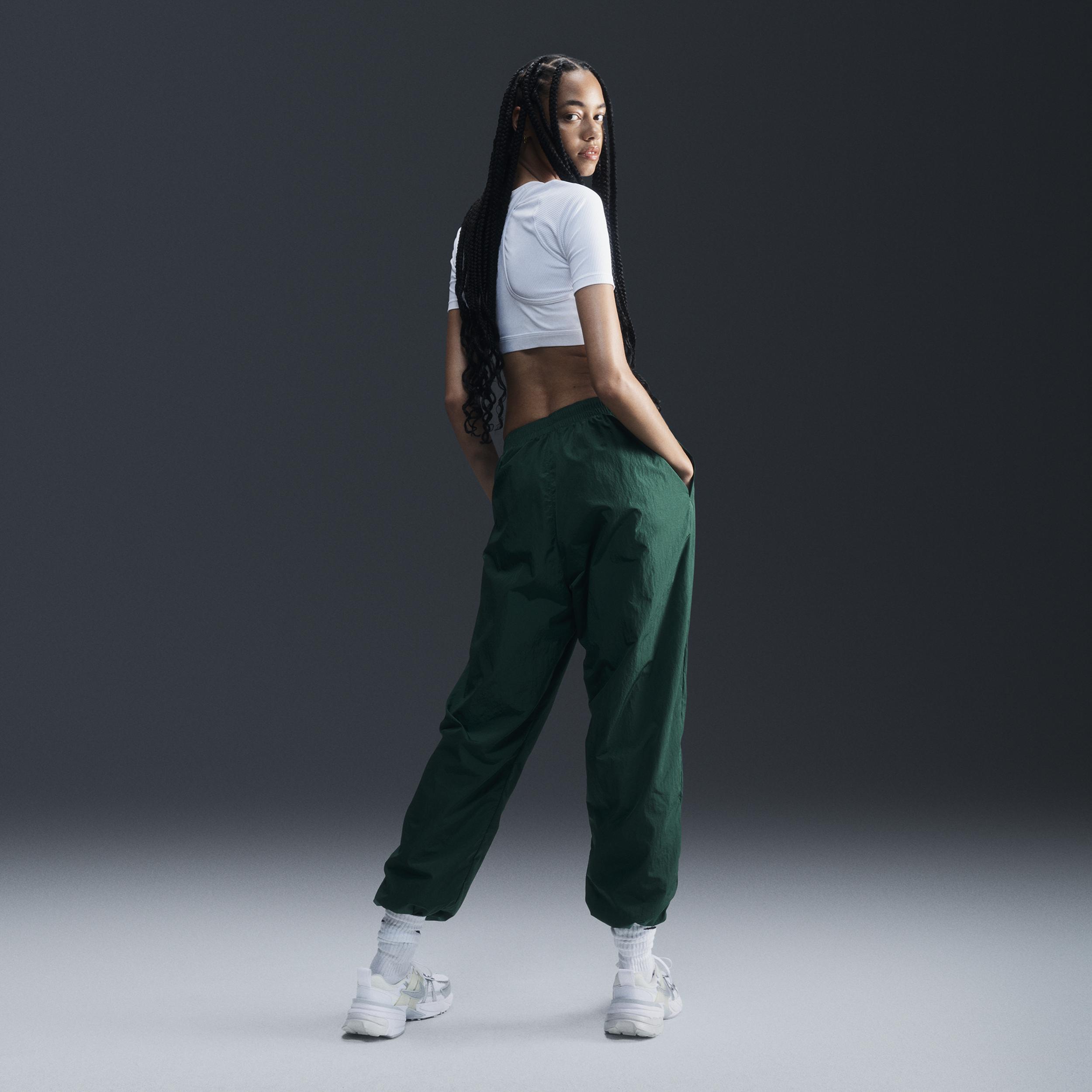 Womens Nike Sportswear Essential Mid-Rise Oversized Woven Jogger Pants Product Image