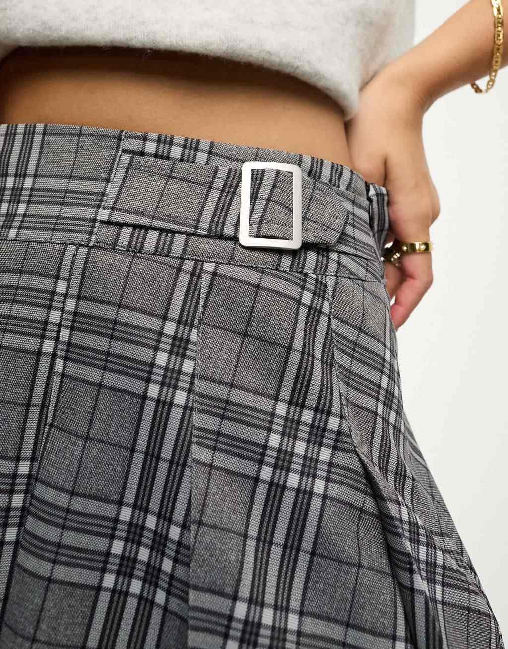 ASOS DESIGN pleated mini kilt skirt with buckle in gray plaid Product Image