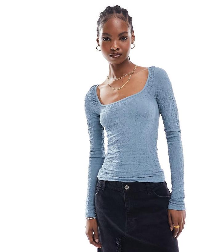 Free People lace texture long sleeve top in slate blue Product Image