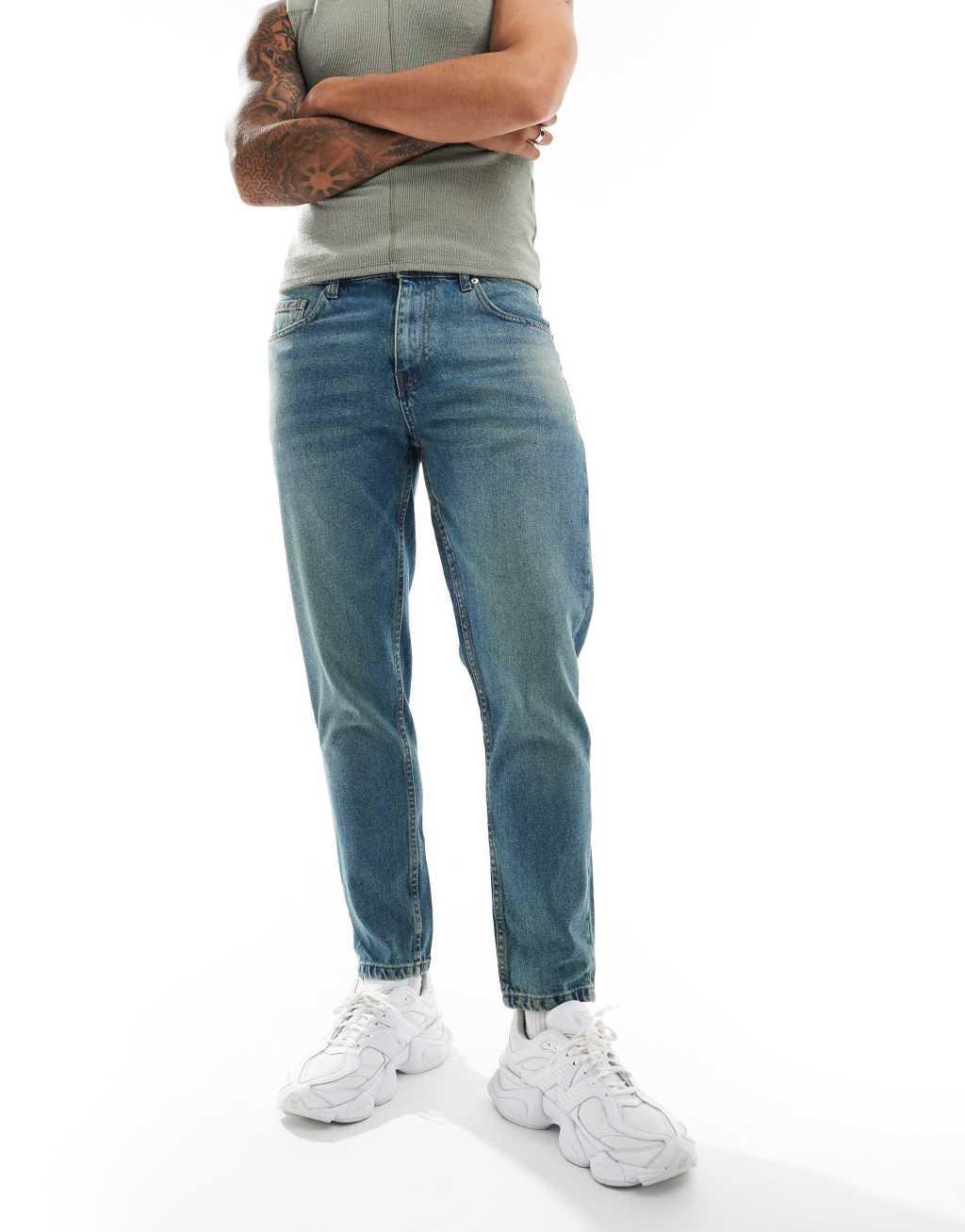 DTT rigid cropped tapered fit jeans in mid blue vintage tint Product Image