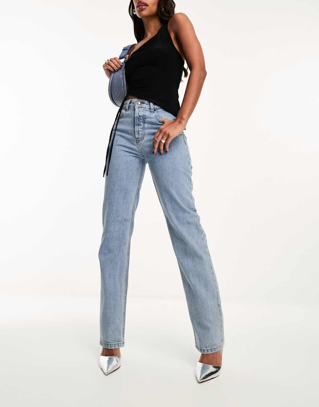 ASOS DESIGN mid rise straight jeans in vintage lightwash Product Image