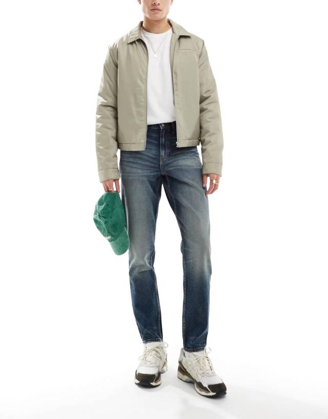 ASOS DESIGN tapered fit in midwash blue Product Image