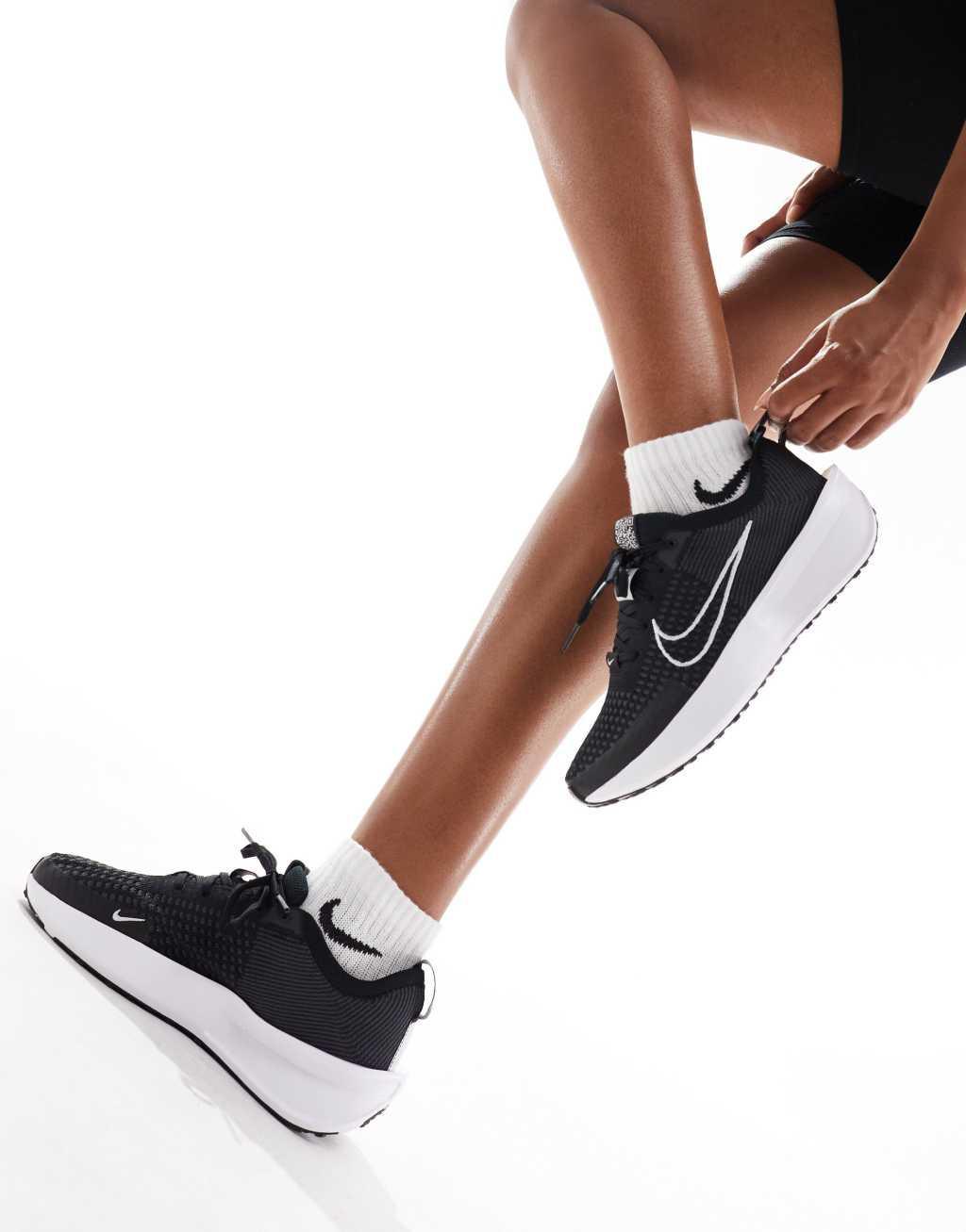 Nike Running Interact sneakers in black  Product Image