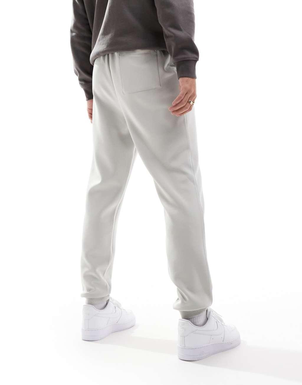 ASOS DESIGN skinny scuba sweatpants in light gray Product Image