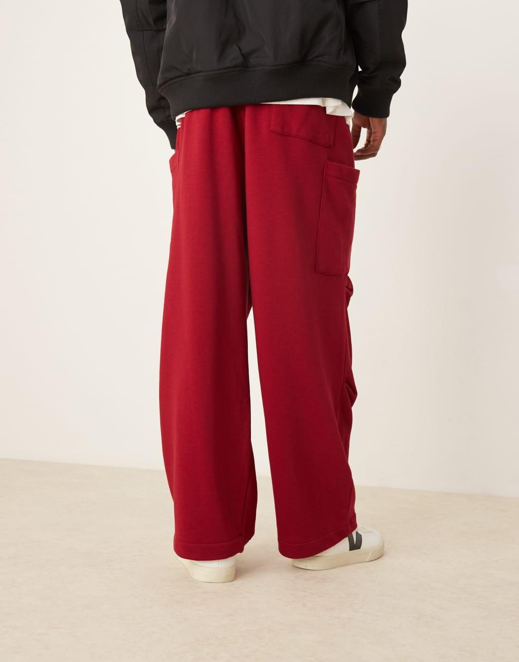 ASOS DESIGN oversized balloon cargo sweatpants in burgundy Product Image