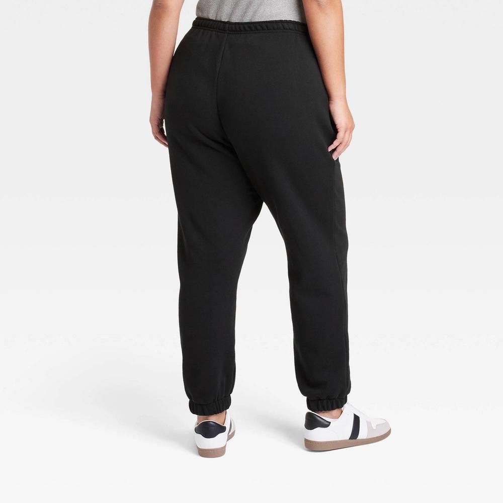 Women's Leisure Studio Mid-Rise Essential Joggers - Universal Thread™ Black 1X Product Image