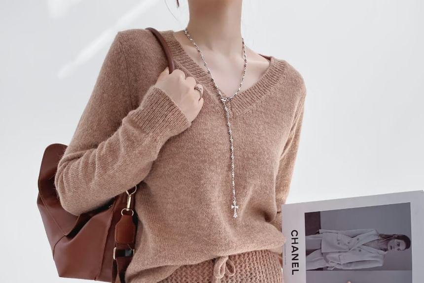 V-Neck Plain Ruffle Hem Sweater Product Image