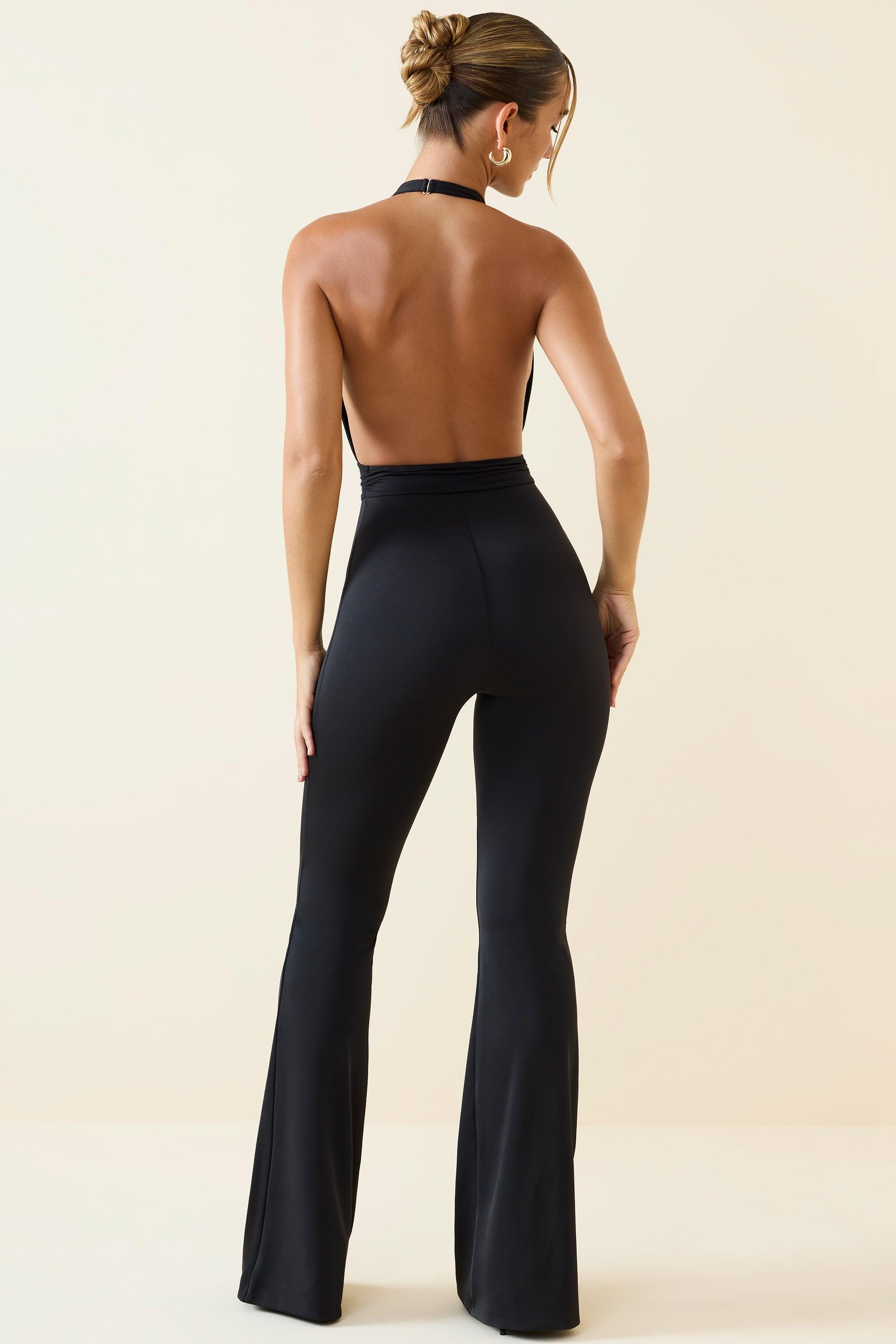 Halterneck Cut-Out Flared Jumpsuit in Black Product Image