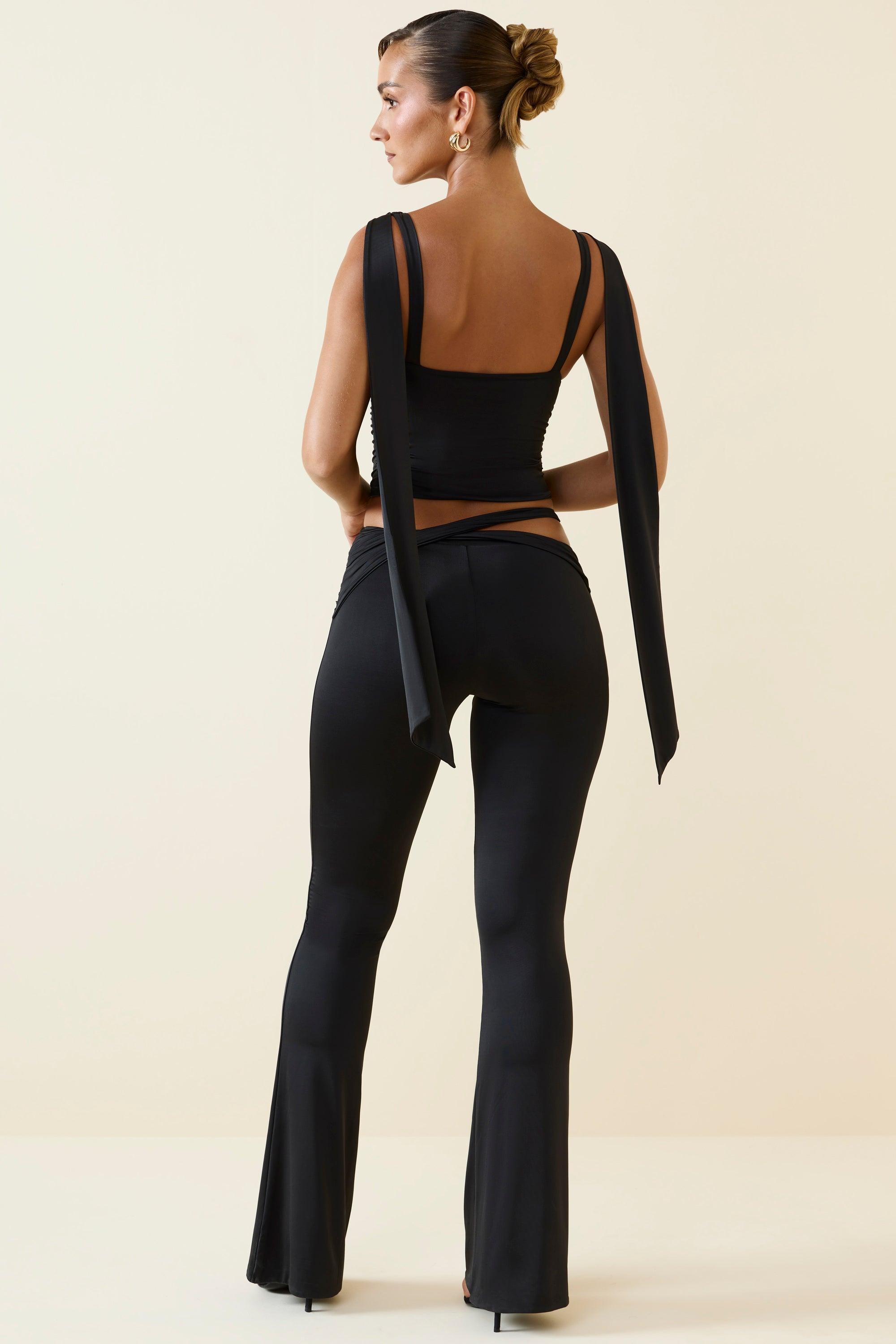 Cut-Out Mid-Rise Flared Trousers in Black Product Image