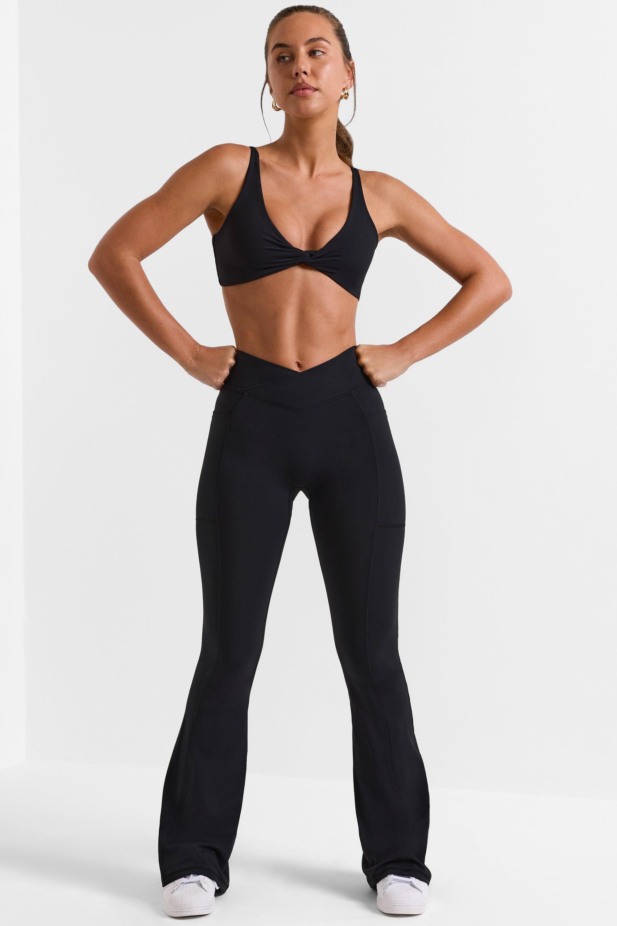 Soft Active Wrap Over Flared Leggings in Black Product Image