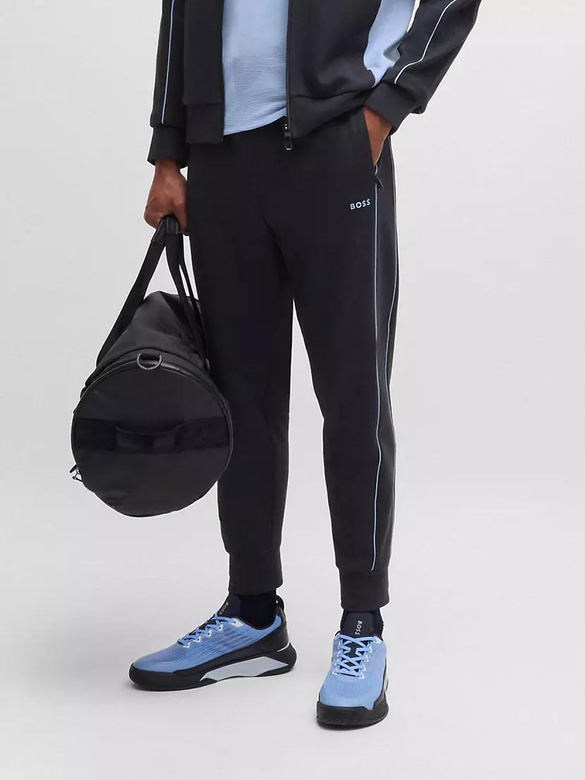 Stretch-Cotton Tracksuit Bottoms with Embossed Artwork Product Image