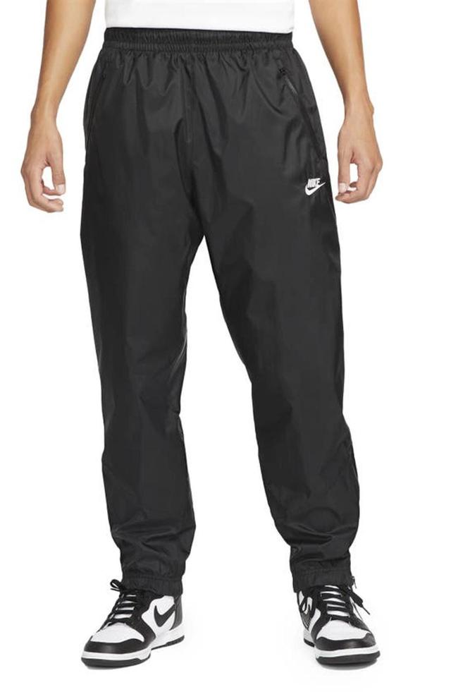 NIKE Men's Windrunner Woven Lined Pants In Black/white Product Image