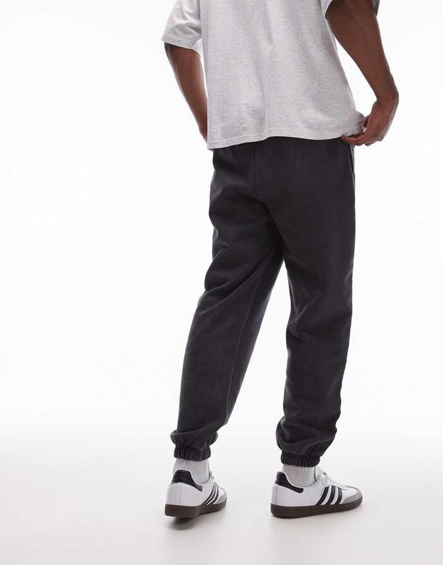 Topman washed oversized sweatpants in black Product Image