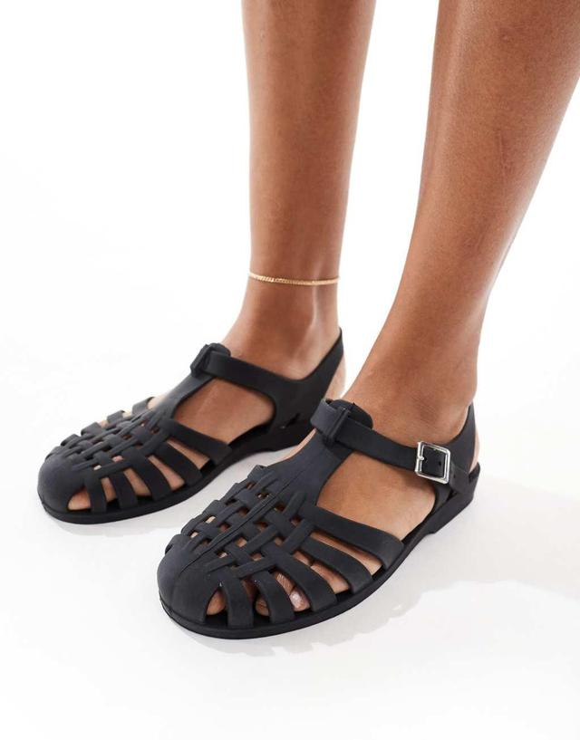 ASOS DESIGN Falcon jelly flat sandals in black Product Image