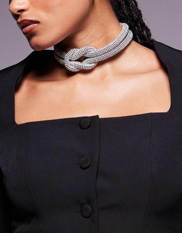 ASOS DESIGN choker necklace with crystal knot design in silver tone Product Image