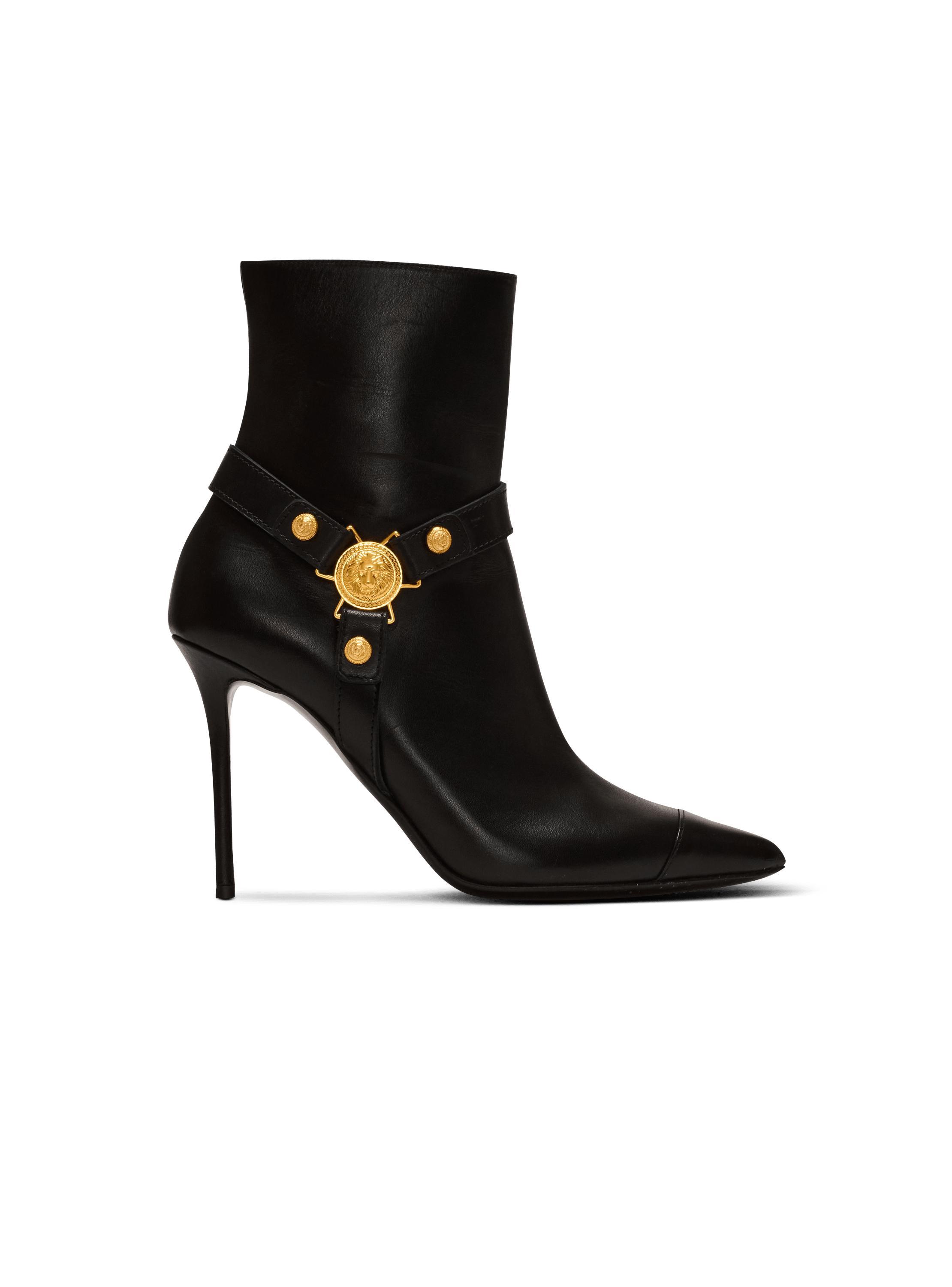 Heeled calfskin Eva ankle boots Product Image