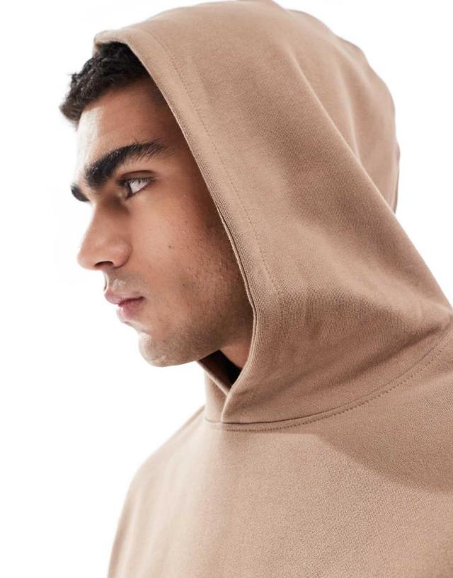 ASOS DESIGN premium heavyweight oversized hoodie in beige Product Image