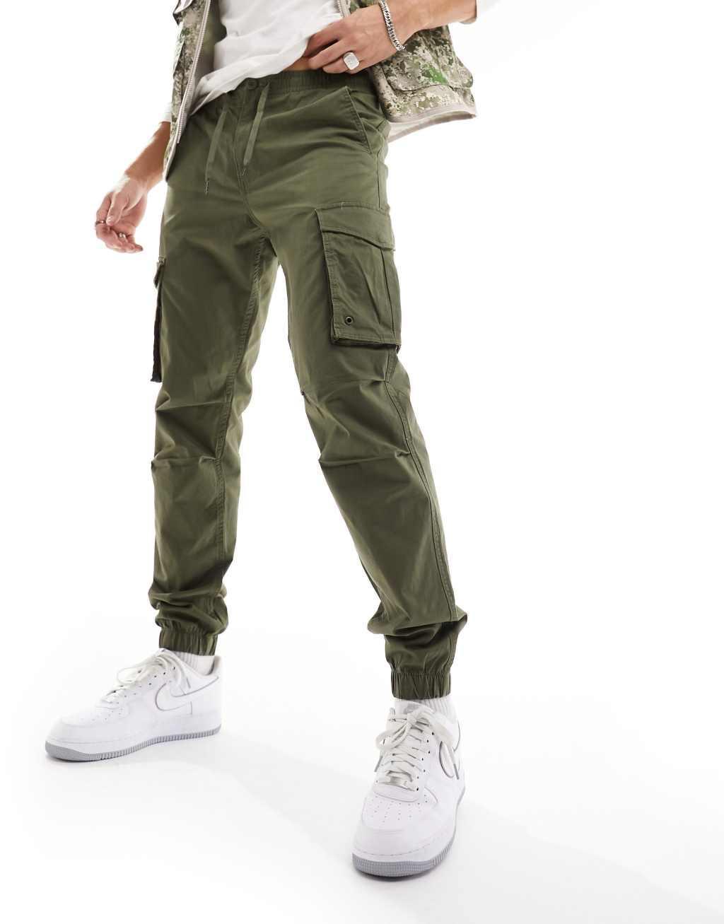 Jack & Jones tapered cuffed cargo in dark green Product Image