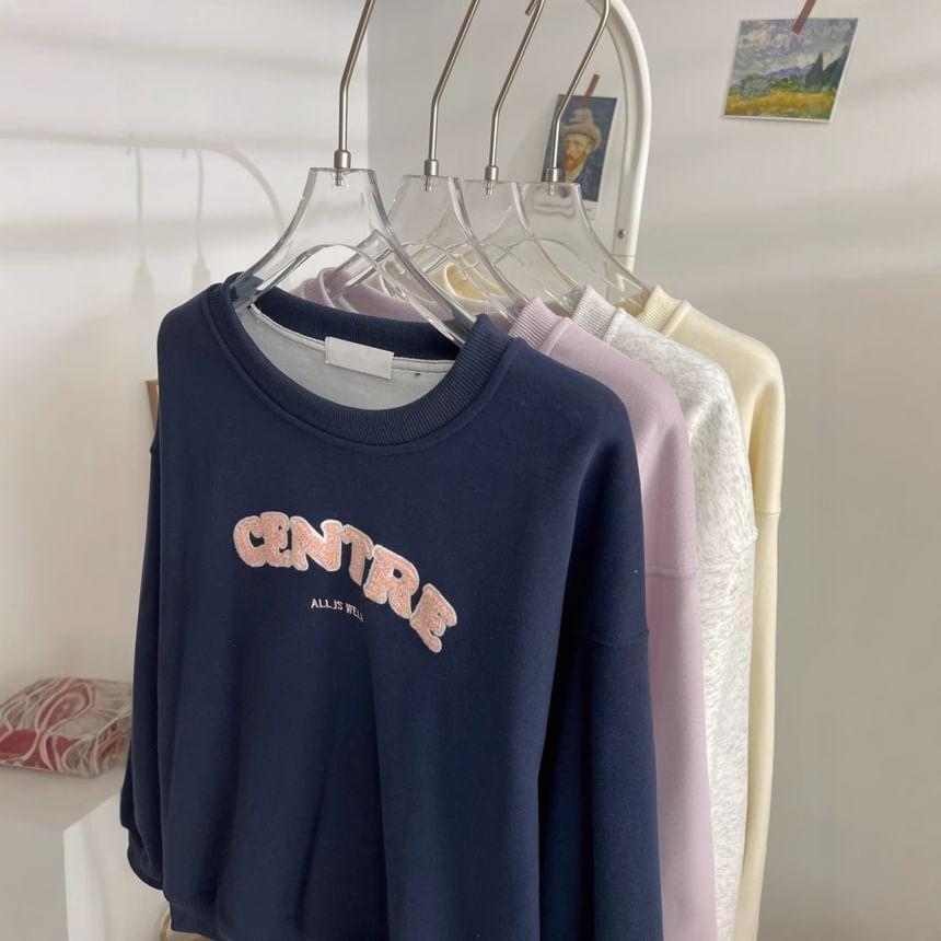 Round Neck Lettering Oversized Sweatshirt Product Image