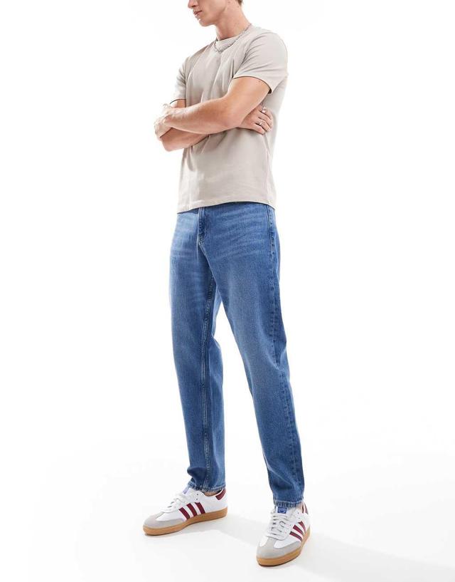 Tommy Jeans Isaac relaxed tapered jeans in mid wash Product Image