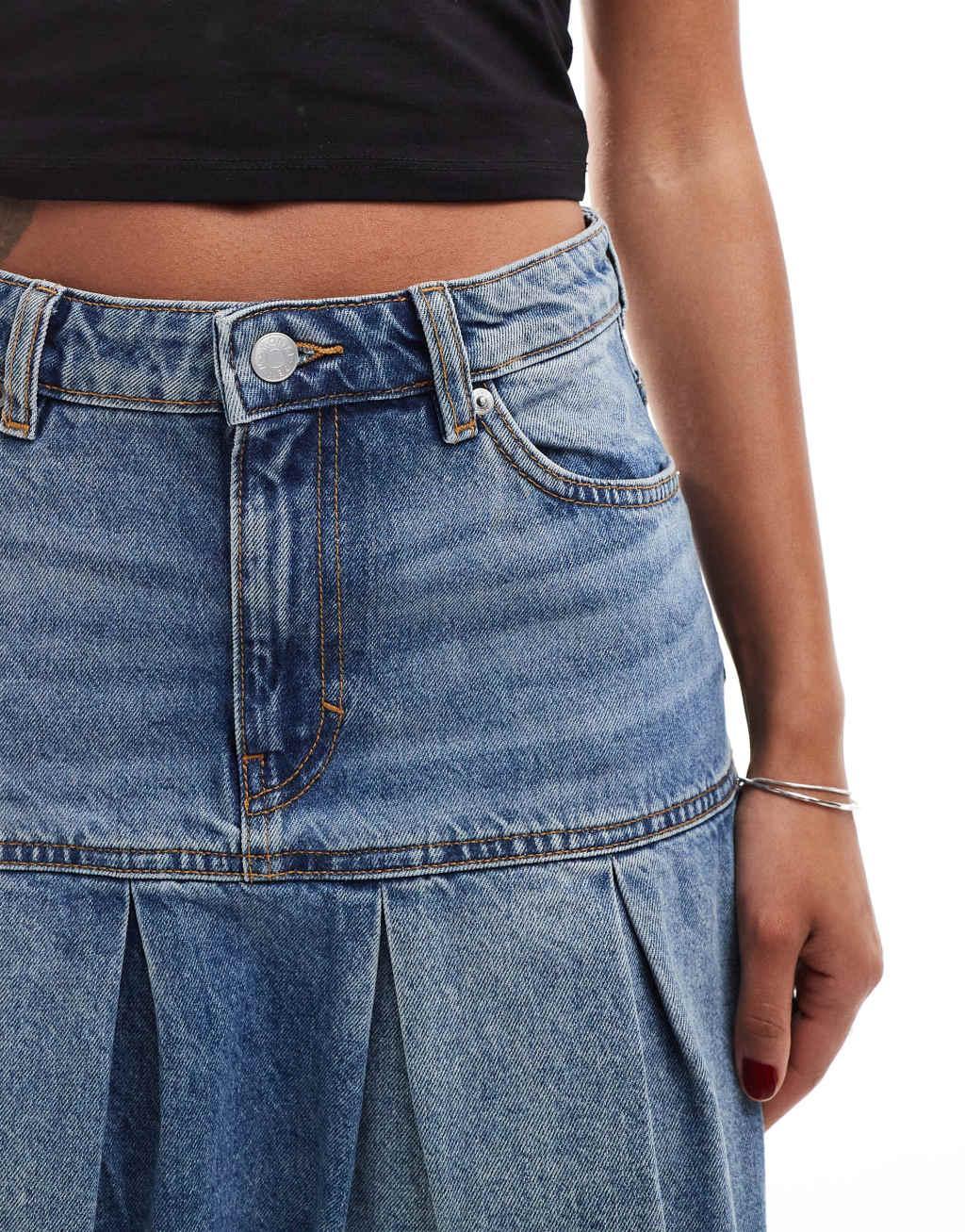 Monki pleated denim mini skirt in midwash blue Product Image