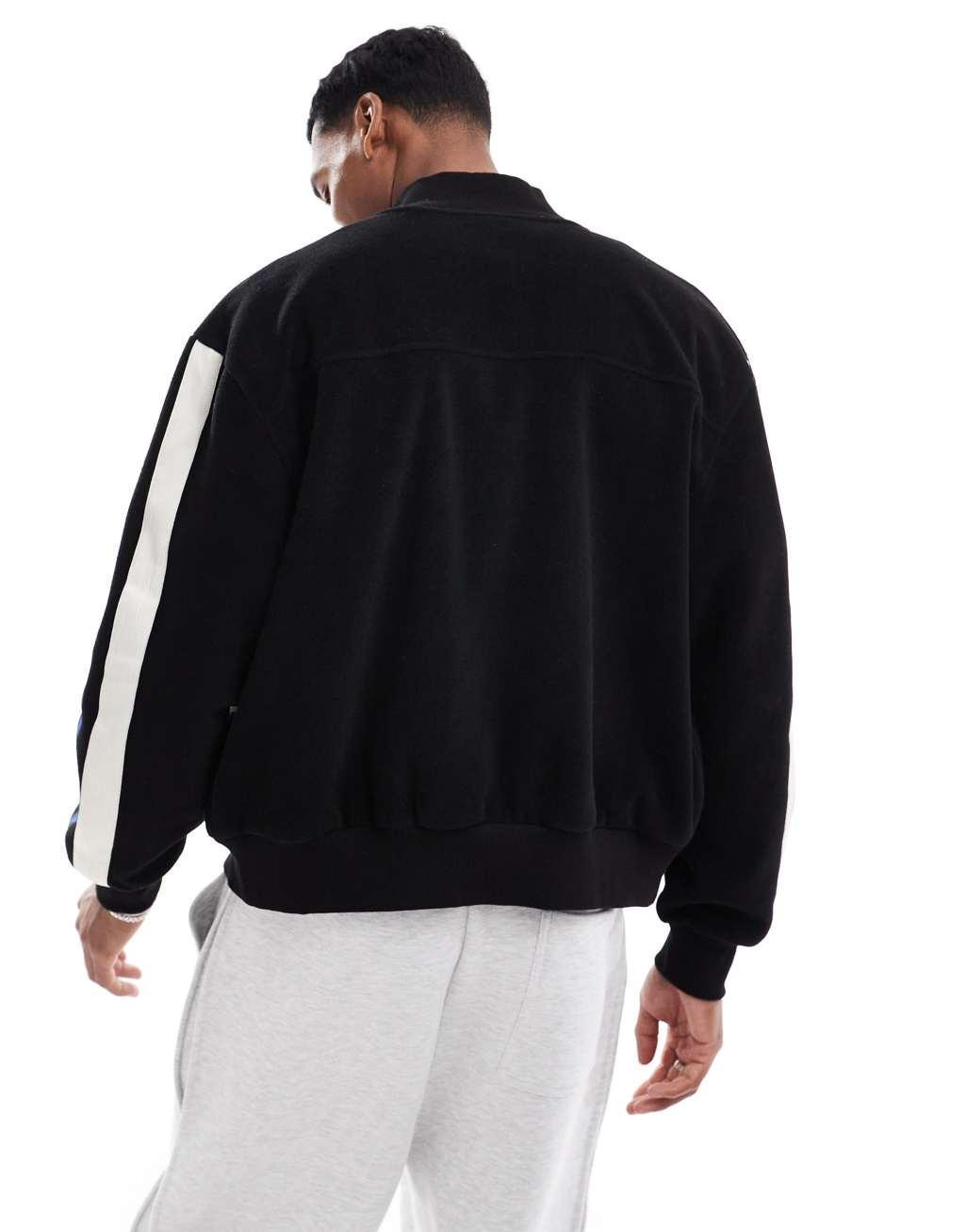 ASOS DESIGN fleece track jacket with taping in black Product Image