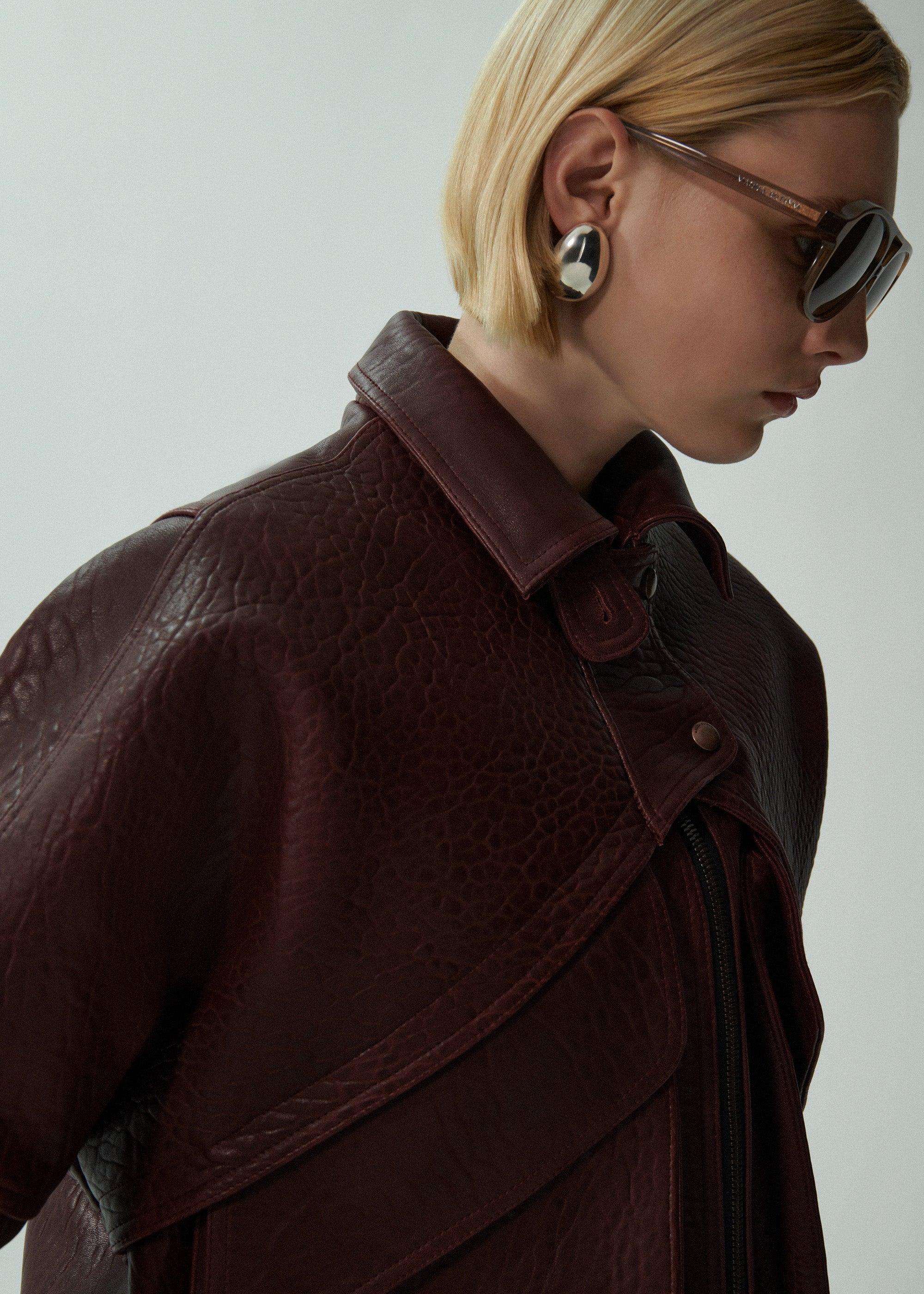 Vintage leather bomber jacket in embossed burgundy Product Image