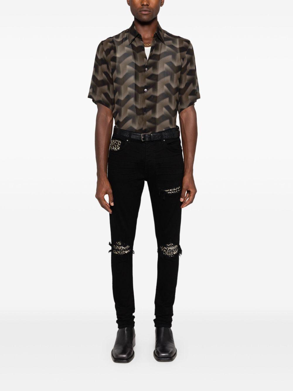 Leopard-detailed Jeans In Black Product Image