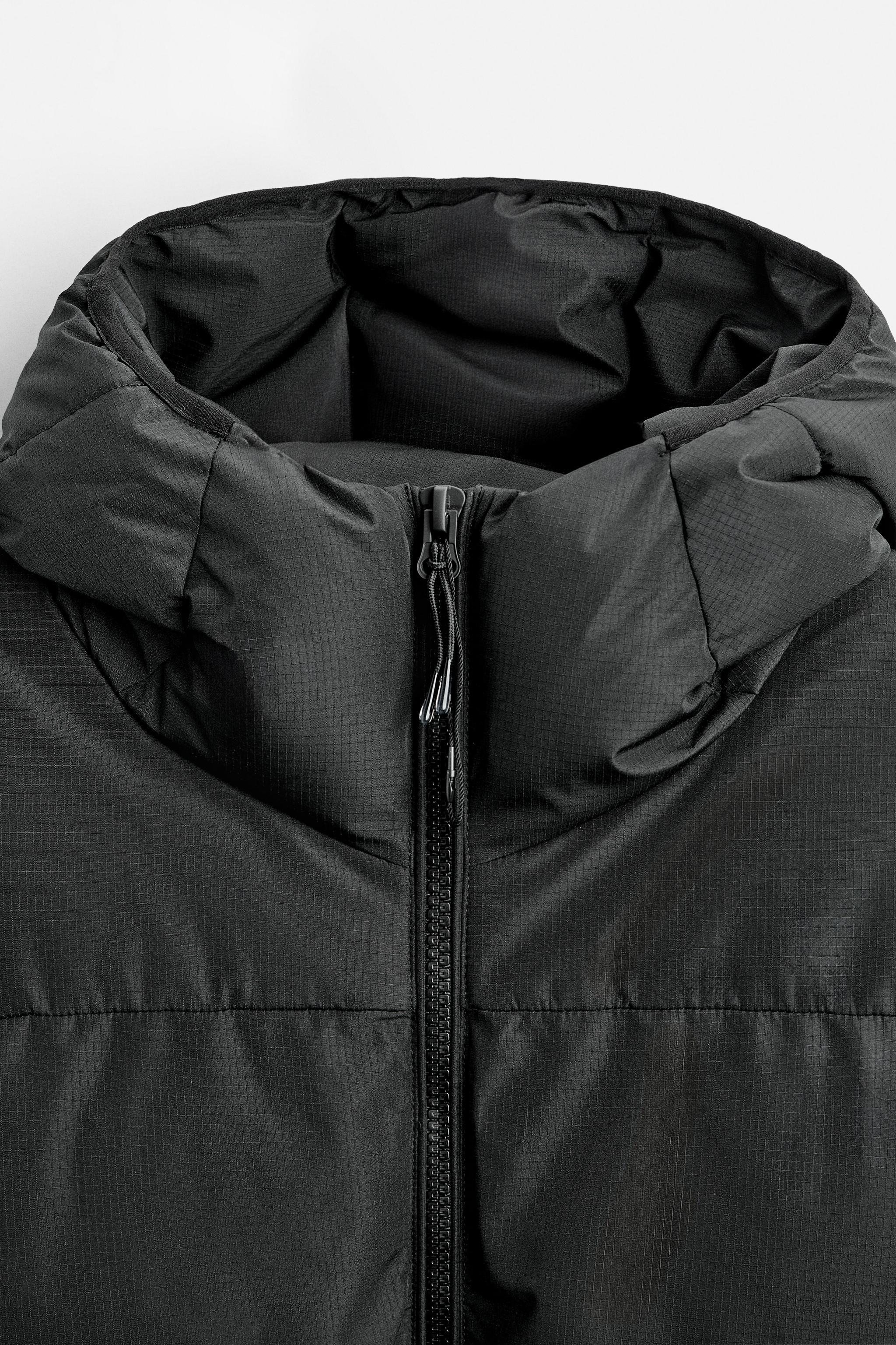 HOODED QUILTED JACKET Product Image