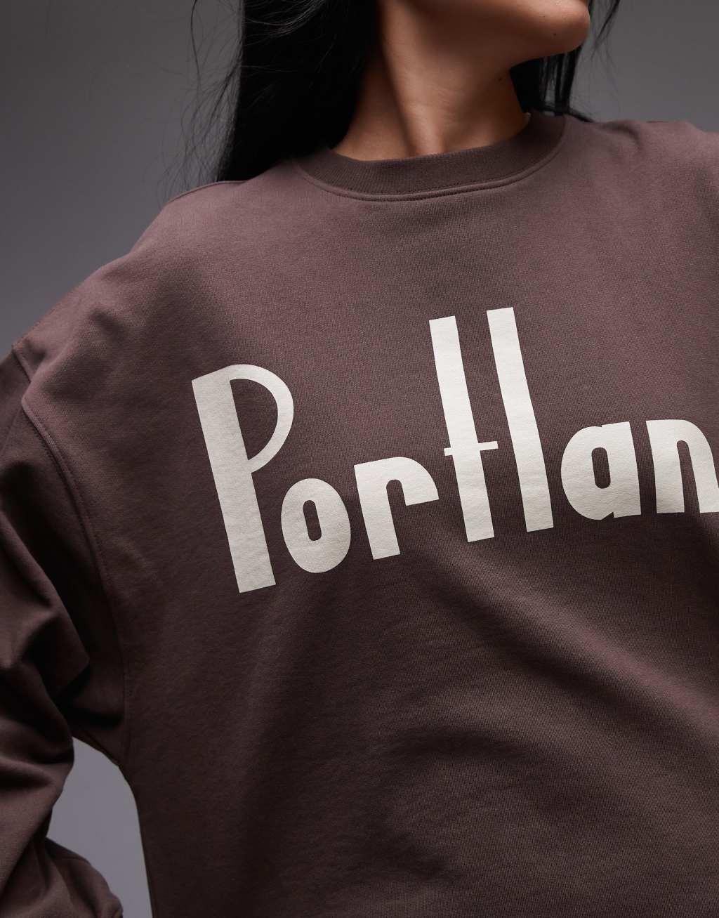 Topshop graphic Portland oversized sweatshirt in brown Product Image