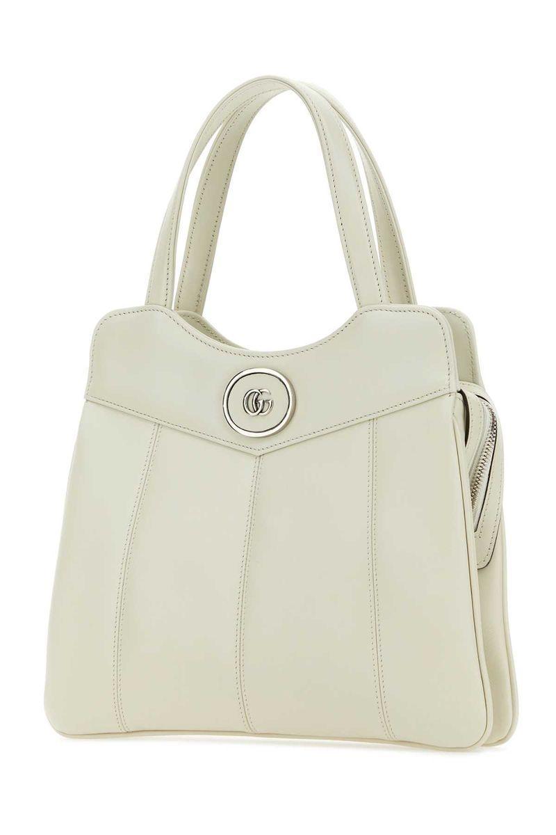 Handbags. In White Product Image