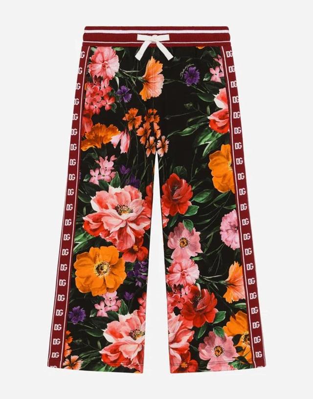 Jersey Jogging Pants With Floral Print Over A Black Background Product Image