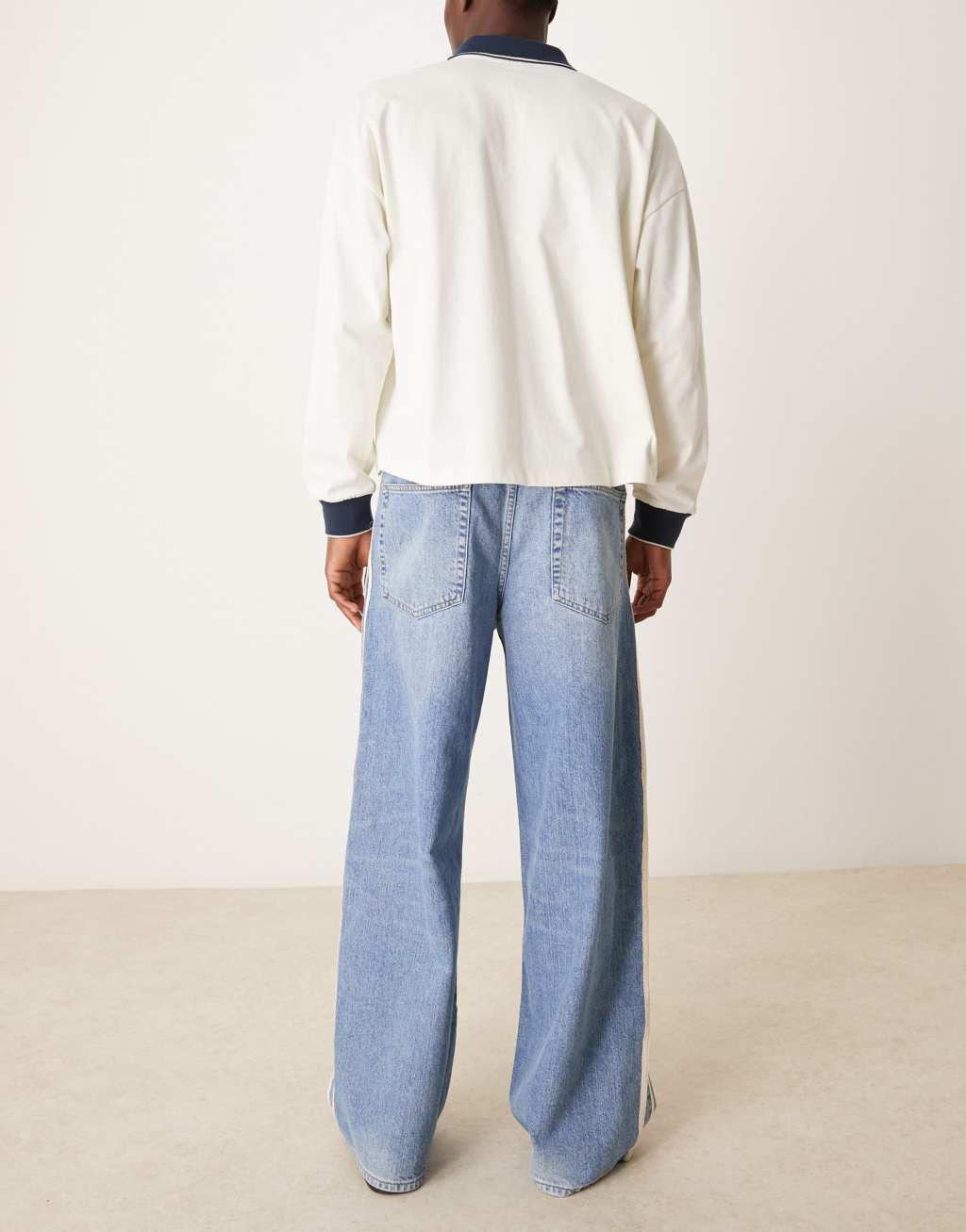 ASOS DESIGN super baggy jeans with side stripe in mid blue wash Product Image