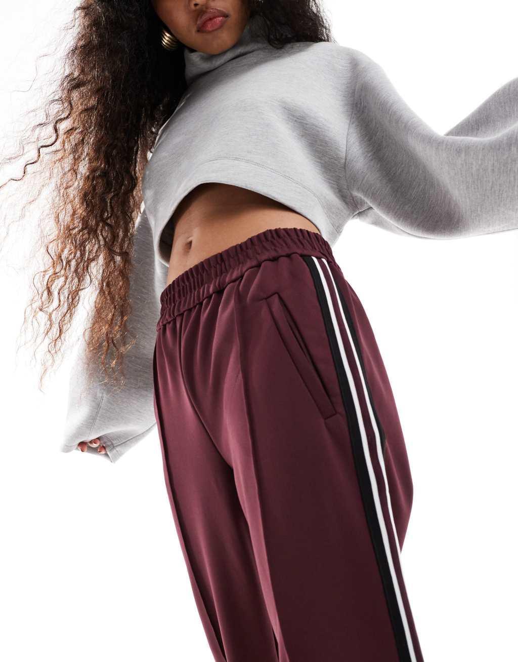 ONLY Petite side panel wide leg track pant in burgundy Product Image